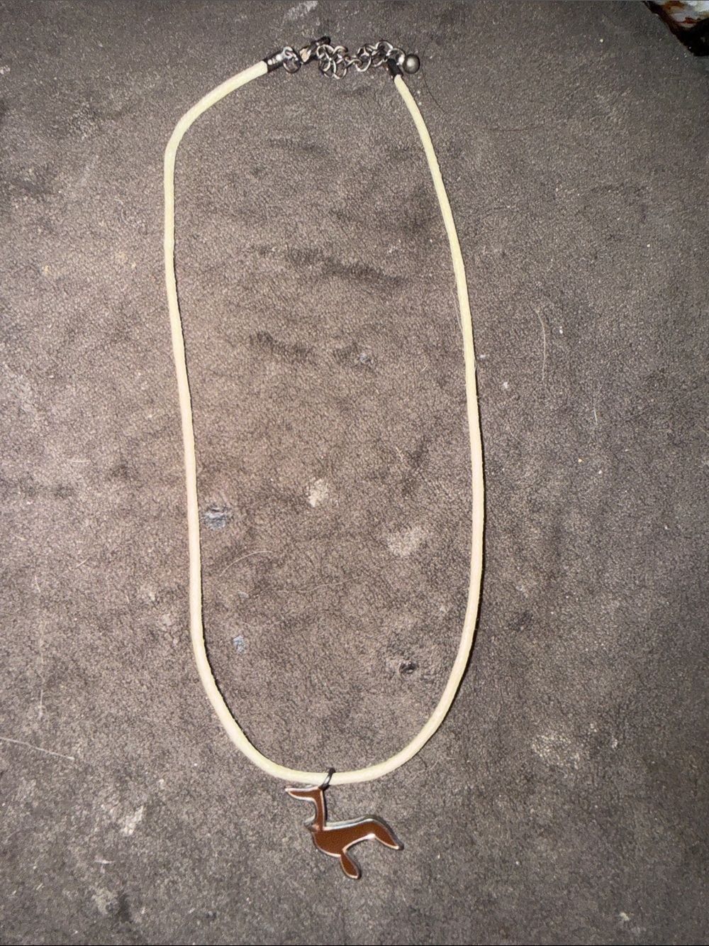 Source Unknown Cream Cord Necklace with Brown Animal Pendant